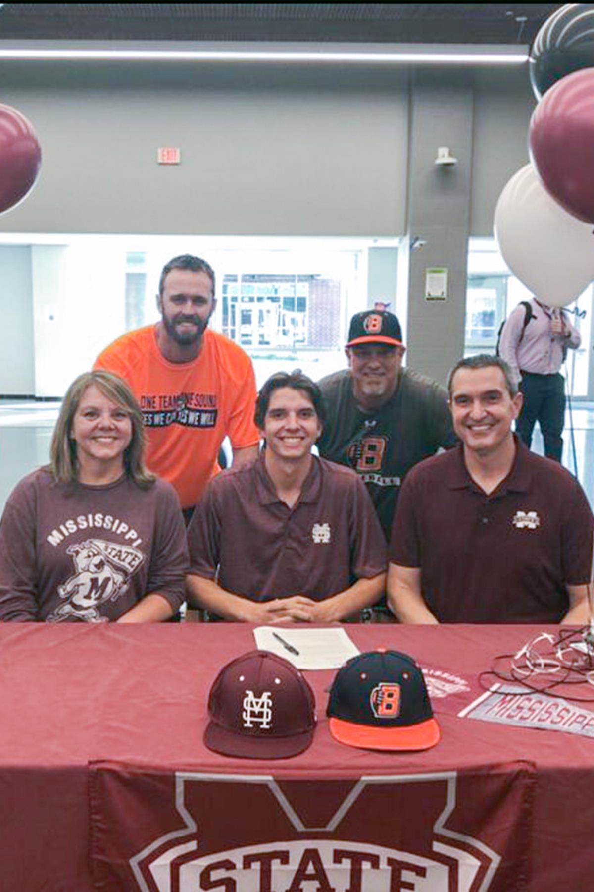 Bridgeland senior Ryan Williams, seated center, signed a letter of intent to play baseball at Mississippi State University.
